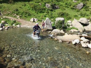 Jaspinder crossing water on a road to bhaderwah from sarthal