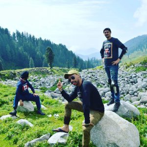 Jaspinder, Mohanbir and Malkit posing near Sarthal